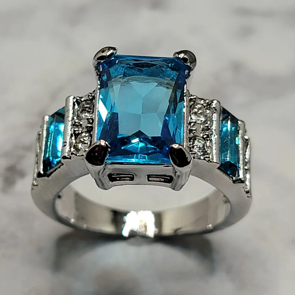 Silver Tone Simulated Blue Topaz Gemstone Ring